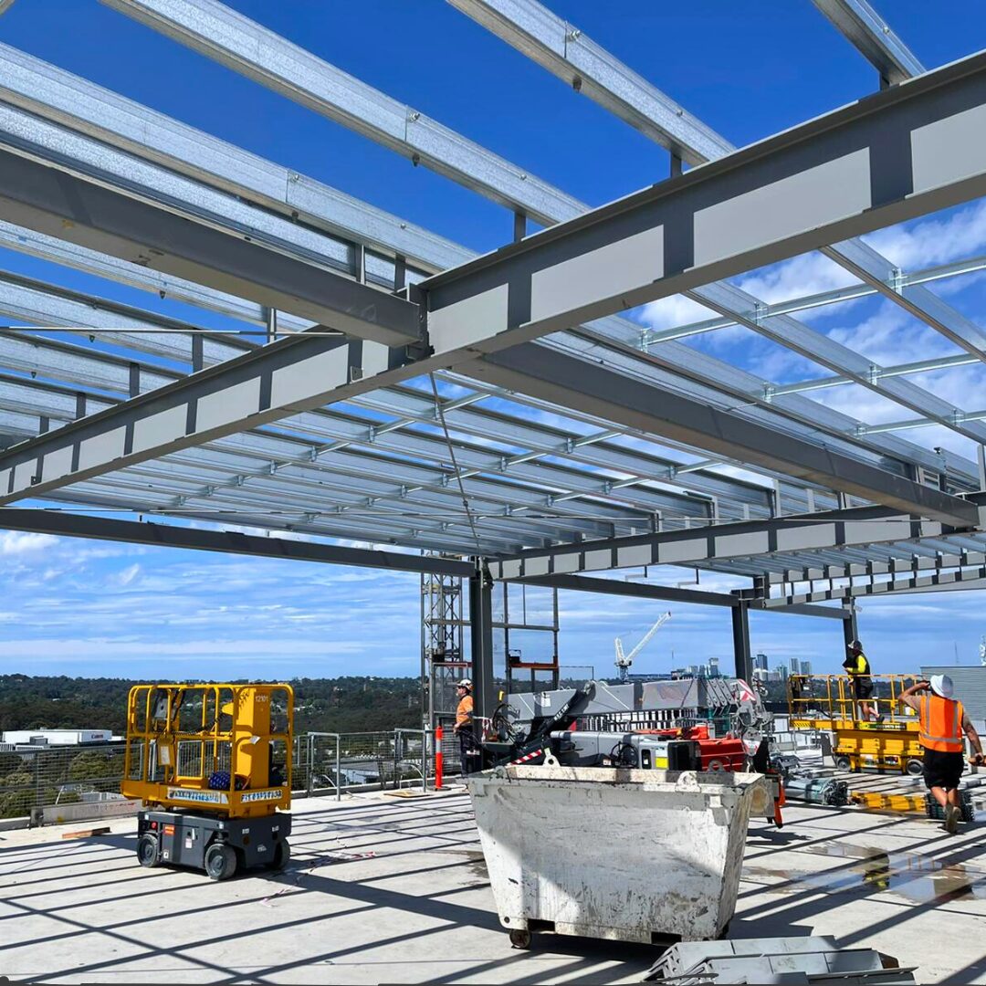 Steel framework installation at Macquarie Park for an onsite steelwork project, ensuring precision and efficiency in structural assembly.